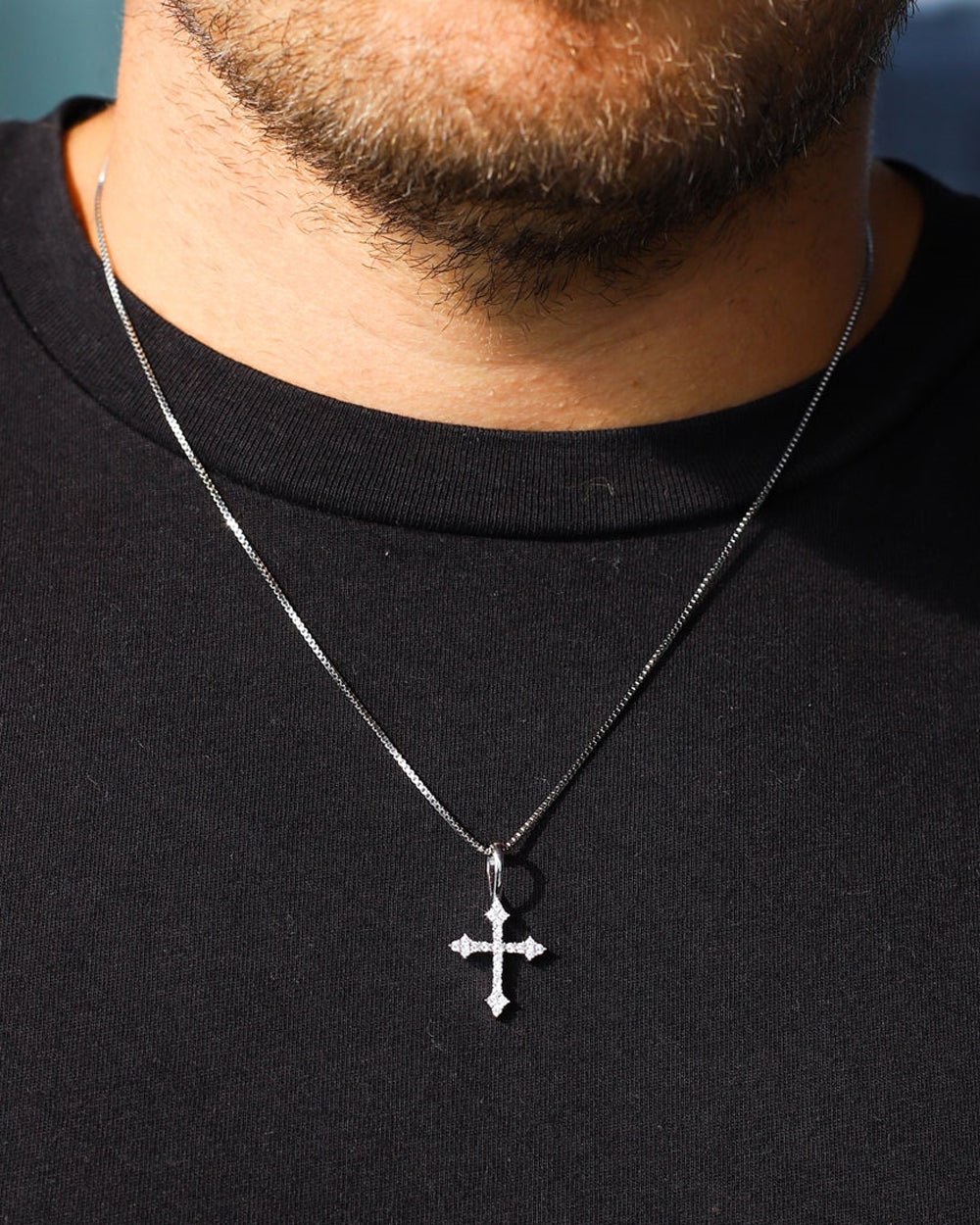 THE CROSS PENDANT.