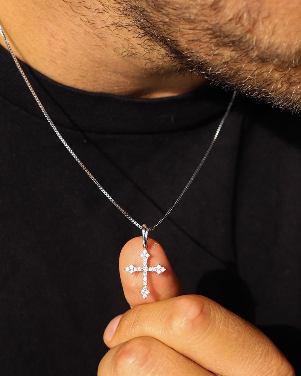 THE CROSS PENDANT.